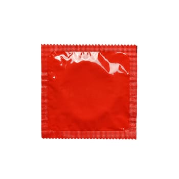 A vibrant red, sealed foil condom wrapper isolated on a clean white background, ideal for health, safe sex, and lifestyle-related stock photography.