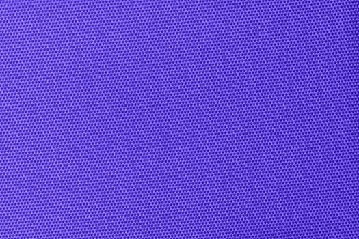 A vibrant purple fabric with a tight honeycomb pattern, creating a modern and clean texture. Ideal for use in fashion, interior design, or as a versatile background element. Violet gradient