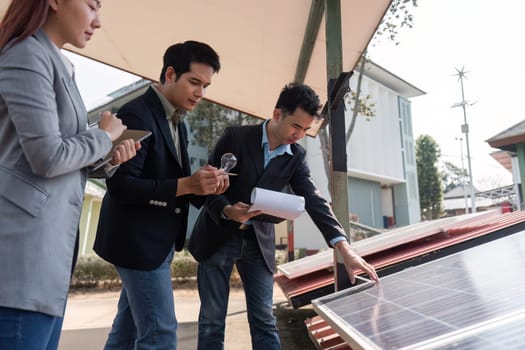 A team of skilled professionals strategizing about solar panel technologies, embodying inclusivity and teamwork in their approach to renewable energy.