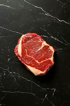 Juicy beef entrecote on dark marble surface. AIi generated.
