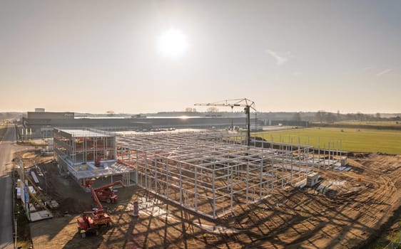 DEVENTER, NETHERLANDS - MARCH 8, 2025: Aerial view of the construction of a new warehouse