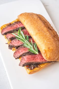 Crispy ciabatta filled with melted cheese, tender steak, sweet onions, and fresh rosemary