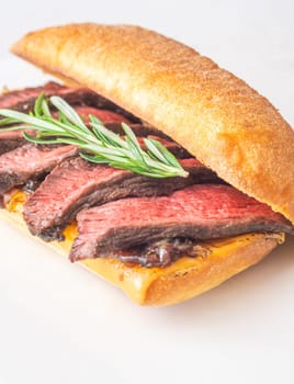 Crispy ciabatta filled with melted cheese, tender steak, sweet onions, and fresh rosemary