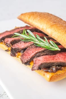 Crispy ciabatta filled with melted cheese, tender steak, sweet onions, and fresh rosemary