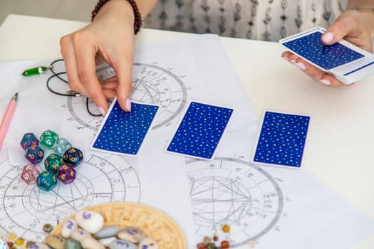 Fortune teller reading with tarot cards. light fortune teller.