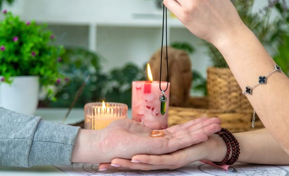 A woman fortune teller speaks to a man. Fortune telling, magic. Bright fortune teller