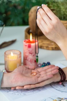 A woman fortune teller speaks to a man. Fortune telling, magic. Bright fortune teller