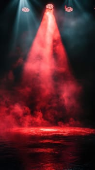 Bright red lights shine down on a foggy stage, creating a mysterious atmosphere. The mist adds depth, enhancing the overall dramatic effect in the evening setting.