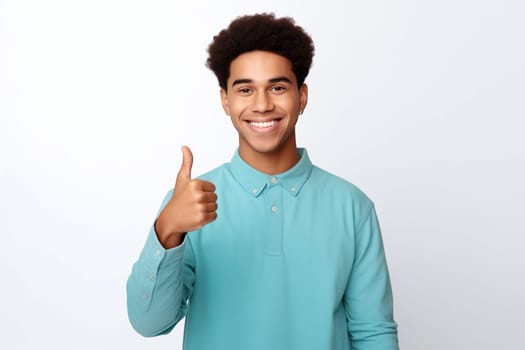 Portrait of happy modern young black American man smiles gives a thumbs up isolated on white background, African male student looking at camera, studio shot