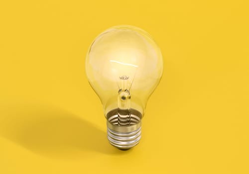 Light bulb on yellow background, creative ideas concept