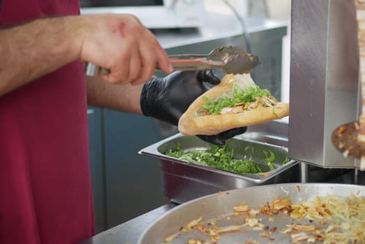 Street Food Vendor Preparing Delicious Sandwich.