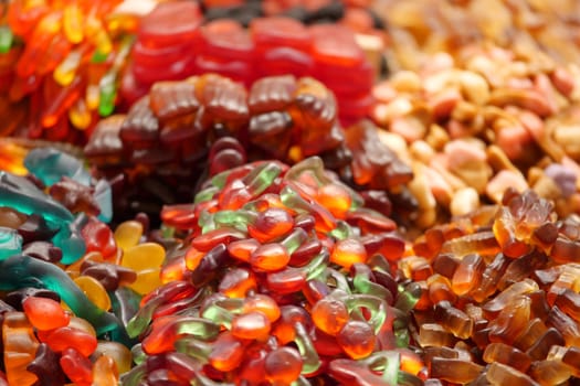 Vibrant collection of gummy candies presents an array of colors and shapes.