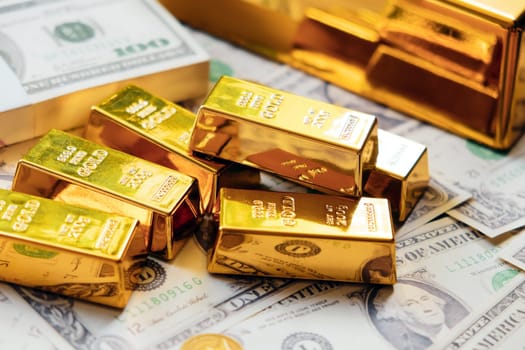 Gold bars and dollar banknotes. Business and finance investment concept.