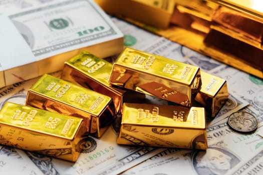 Gold bars and dollar banknotes. Business and finance investment concept.