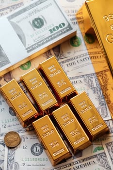 Gold bars and dollar banknotes. Business and finance investment concept.