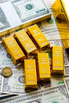 Gold bars and dollar banknotes. Business and finance investment concept.