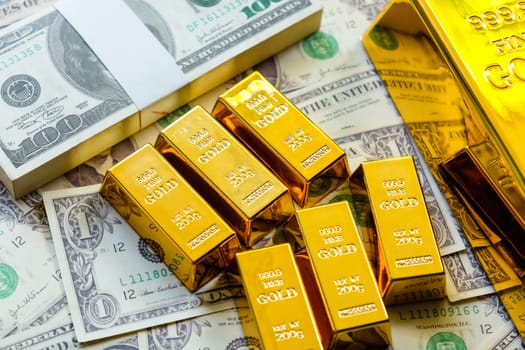 Gold bars and dollar banknotes. Business and finance investment concept.