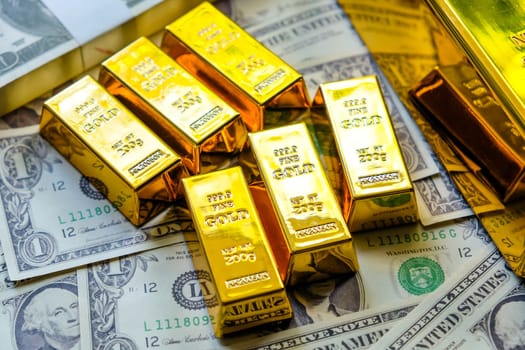 Gold bars and dollar banknotes. Business and finance investment concept.