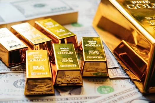 Gold bars and dollar banknotes. Business and finance investment concept.