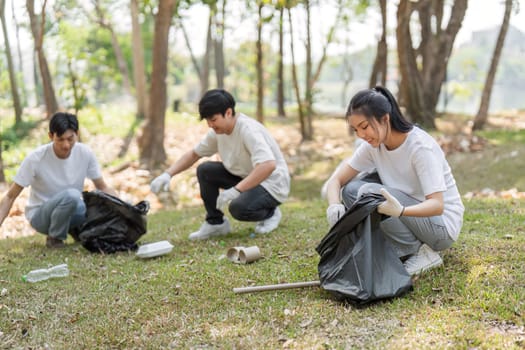 A group of friends is involved in a park cleanup, showcasing teamwork and a commitment to sustainability.