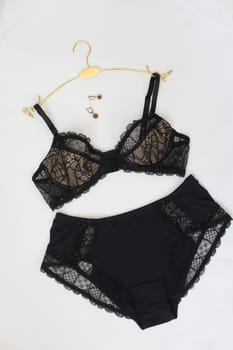 Lace sexy female underwear, flat lay top view copy space. Fashion Concept. Women's bra, panties, erotic clothes. Lingerie advertising