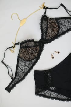 Lace sexy female underwear, flat lay top view copy space. Fashion Concept. Women's bra, panties, erotic clothes. Lingerie advertising