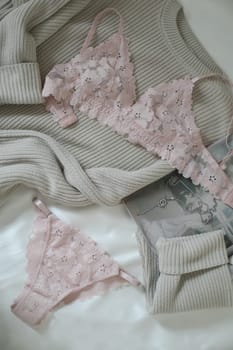 Lace sexy female underwear, flat lay top view copy space. Fashion Concept. Women's bra, panties, erotic clothes. Lingerie advertising