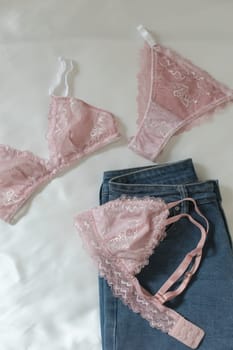Lace sexy female underwear, flat lay top view copy space. Fashion Concept. Women's bra, panties, erotic clothes. Lingerie advertising