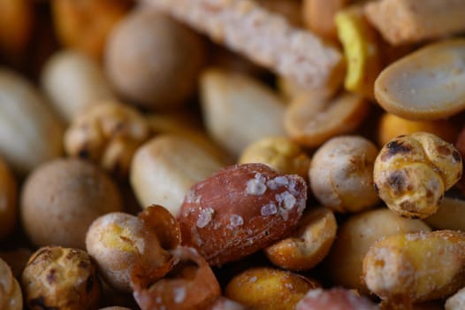 A vibrant assortment of nuts and seeds showcases an array of textures and flavors, perfect for snacking.