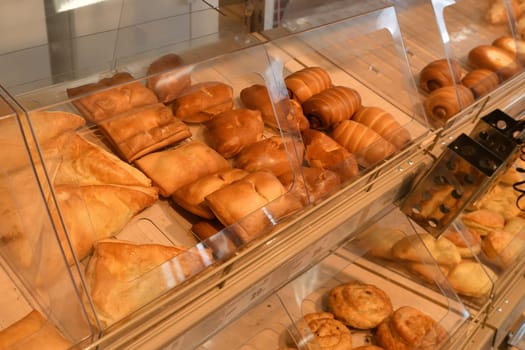 Pies and sweet pastries on display at bakery