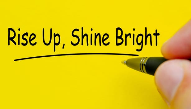 Rise up and Shine Bright text on yellow cover background.