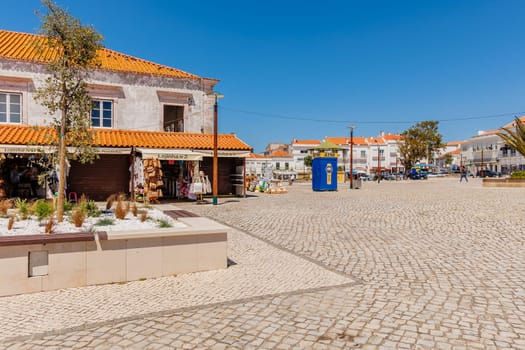 Nazare, Portugal - May 28, 2024: The central square of Nazare Sitio on the hill with its tourists and street vendors on a beautiful spring day