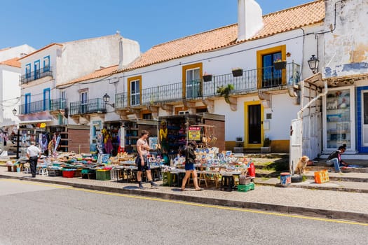 Nazare, Portugal - May 28, 2024: The central square of Nazare Sitio on the hill with its tourists and street vendors on a beautiful spring day