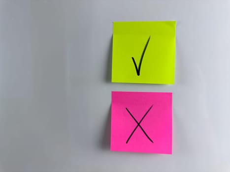 Post it notes with tick and cross when choosing answer option. True or False, conceptual photo about decision making and choosing from many options