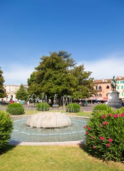 Verona, Italy - June 2022: the Fountain of Alps, located in Piazza Bra garden
