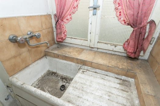 Old vintage sink to renovated. Improvement. Dirt.