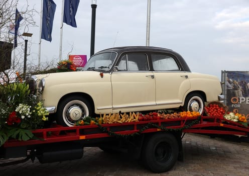 Noordwijk, Netherlands - April 22, 2023: Cars decorated with flowers taking part in the Bloemencorso Bollenstreek the annual spring flower parade from Noordwijk to Haarlem in the Netherlands.
