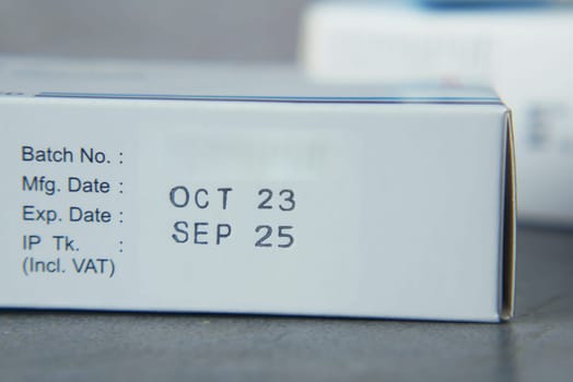 Packaging shows manufacturing and expiration dates for a product.