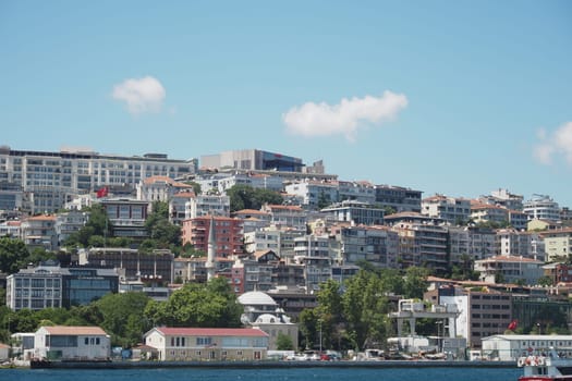 Homes and buildings line the hillside overlooking the water.