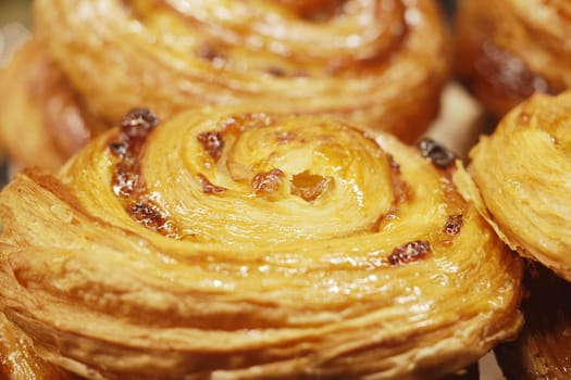 Delicious cinnamon rolls showcase golden brown texture and swirl design.