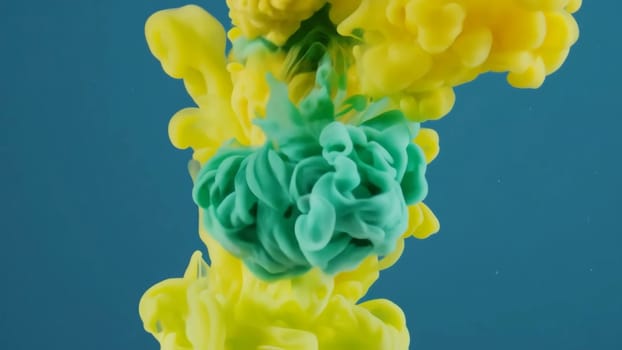 Colorful flowing ink and liquid paint blend seamlessly in a striking backdrop, showcasing a mesmerizing dance of vibrant hues that captivate the viewers attention.