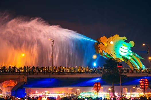 Fire water show on Dragon Bridge or Cau Rong Bridge in Da Nang in Vietnam in Asia at night
