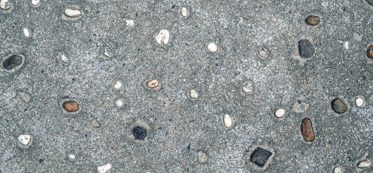 abstract grey background with asphalt texture with sidewalk stones