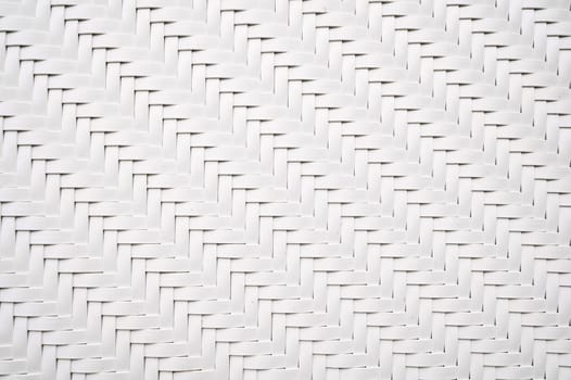 white background with artificial texture of woven rattan. Abstract braided Pattern