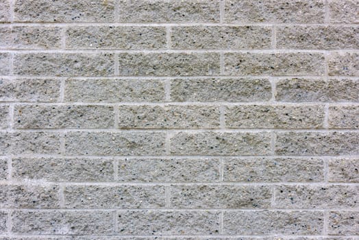 Concrete wall stylized under texture of silicate brick masonry.