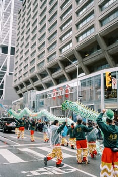 An exciting street celebration with a vibrant traditional dragon dance performance
