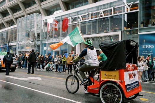 A lively parade scene full of festive spirit, celebrating a diverse community