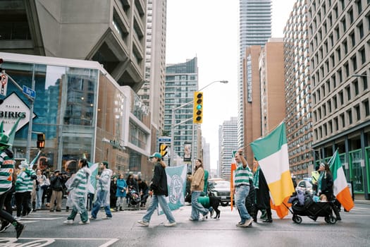 The joyful celebration of diverse culture occurs during St. Patricks Day parade