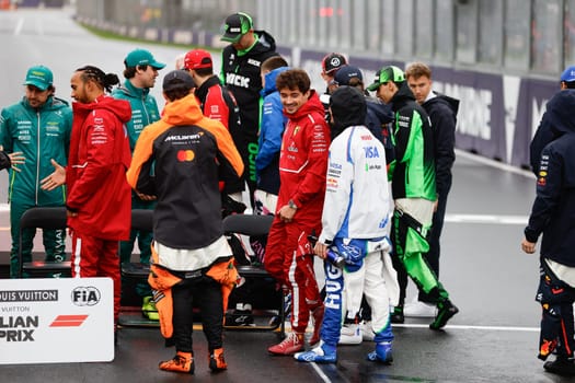 MELBOURNE, AUSTRALIA - MARCH 16: F1 drivers prepare for annual grid photo during the 2025 Australian Grand Prix at Albert Park in Melbourne, Australia