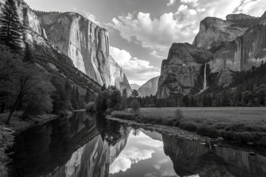Towering granite cliffs frame a serene river in Yosemite Valley. Lush trees line the banks, and wispy clouds drift across the sky, creating a tranquil atmosphere in monochrome tones.